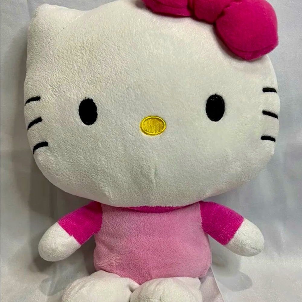 Hello Kitty Plush Doll 15” Tall  Pink Shirt Bow Stuffed doll . perfect condition